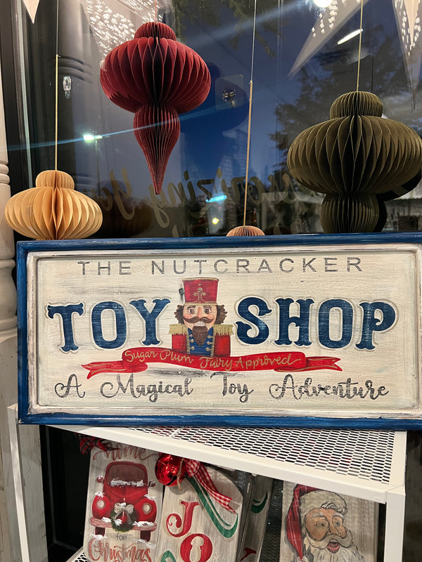 Toy Shop Mantel Sitter